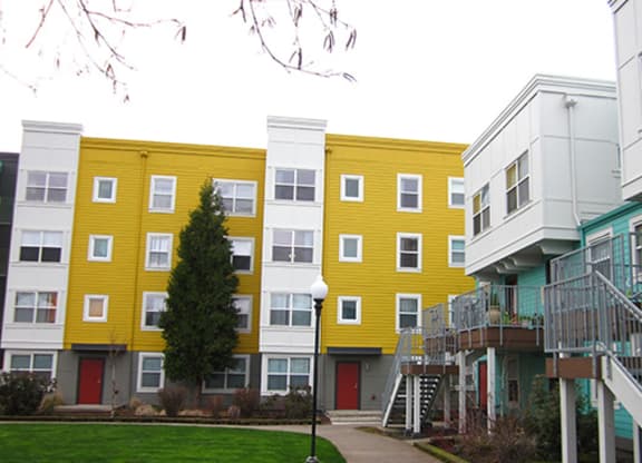 a group of buildings with different colors on them