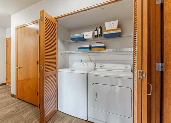 A laundry room with a washer and dryer.