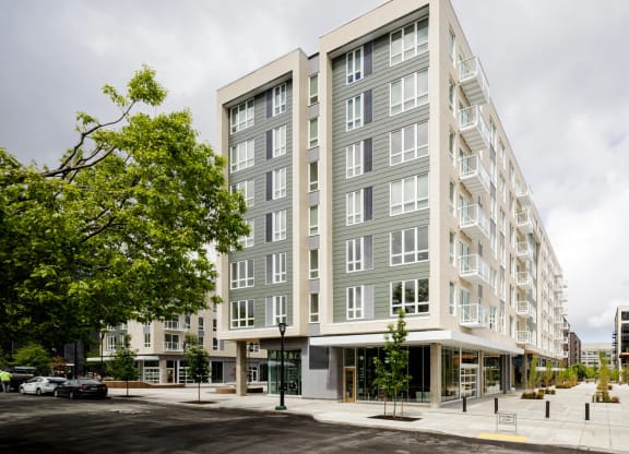 apartment building with pedestrian walkway at Slabtown Square Apartments, Portland , OR 97209
