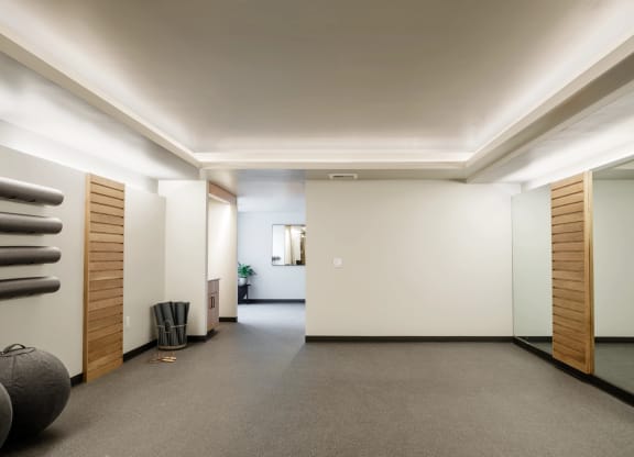 gym with mirrors and equipment at Slabtown Square Apartments, Oregon, 97209