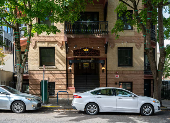 a house with a white car parked in front of it