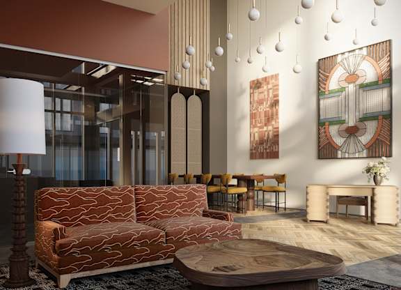 A living room with a brown sofa and a coffee table.