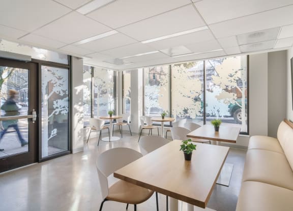 a room filled with furniture and a large window
