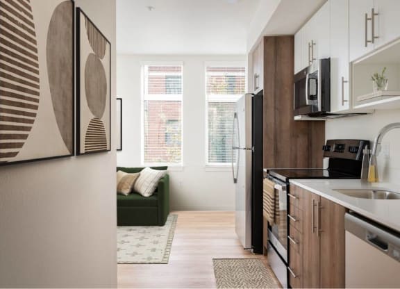 a kitchen and living room in a small apartment