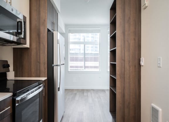 a kitchen with a large window and a