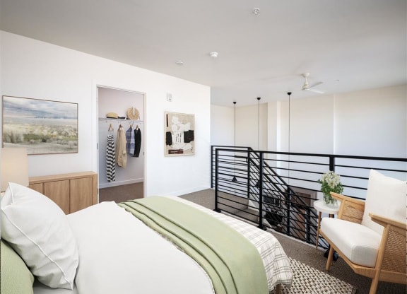 a bedroom with a bed and a balcony