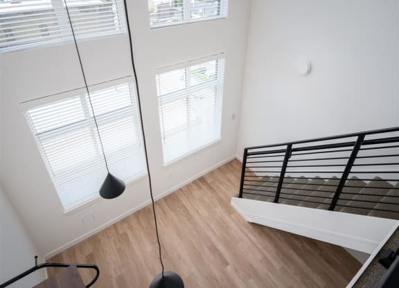 an overhead view of a bedroom with a bed and a window