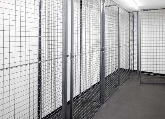 A room with a metal grid partitioning the space.