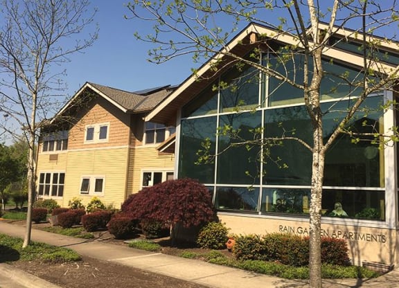 a building with a large glass window on the front of it