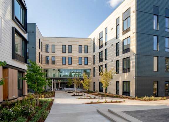 A modern building with a courtyard in the middle.
