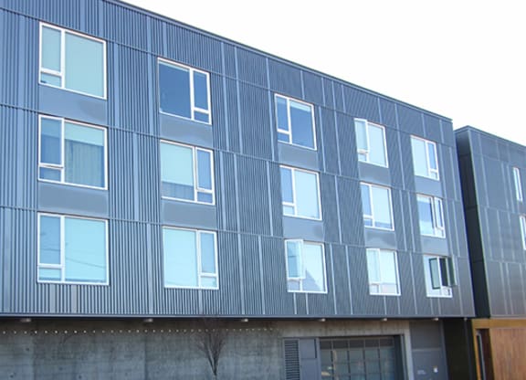 the side of a building with a lot of windows