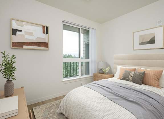 A bedroom with a large bed and a painting on the wall.