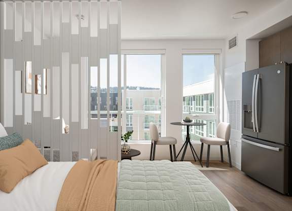 A modern bedroom with a large bed and a view of the city.