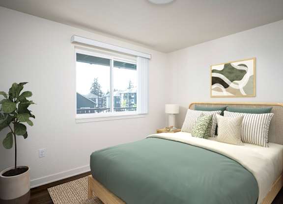 A bedroom with a bed, nightstand, lamp, and a plant.