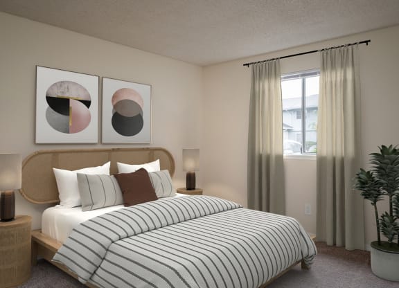 a bedroom with a bed with a white comforter
