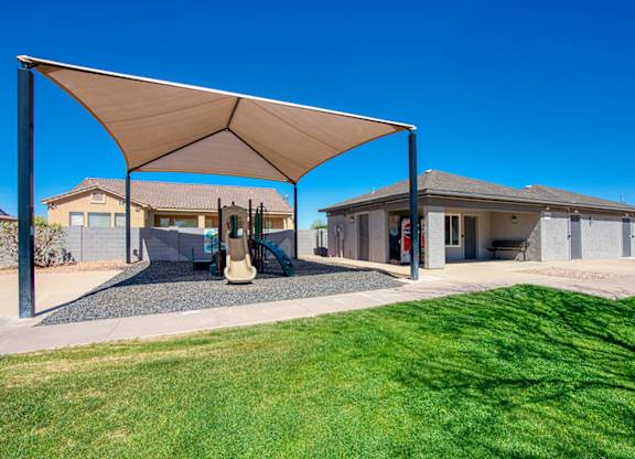 A house with a covered patio area.