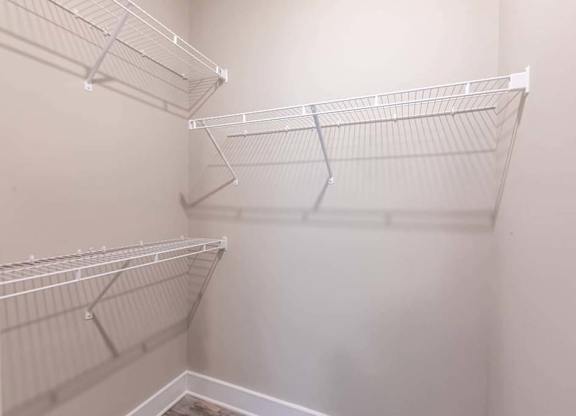 Empty white shelves in a room at Foxwood Apartments, Raleigh-Durham, NC, 27616
