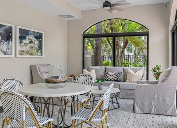 An indoor seating area next to a window.