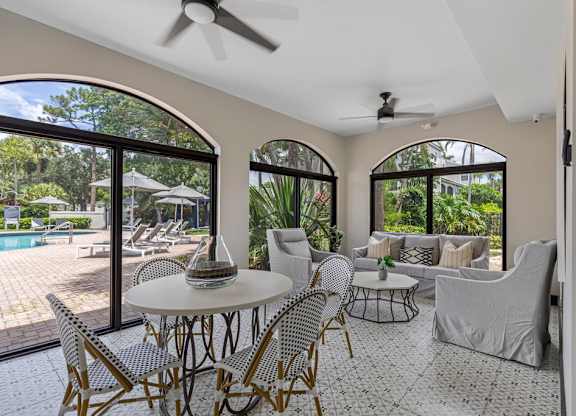 A patio with a table and chairs is shown.