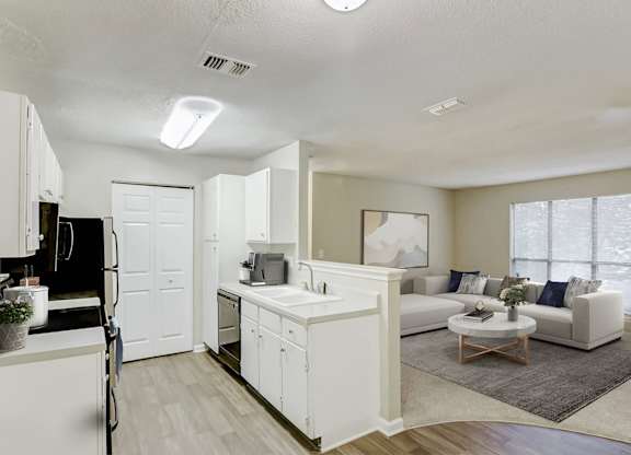 Kitchen And Living Area View at Brandemere Apartment Homes, North Carolina, 27106