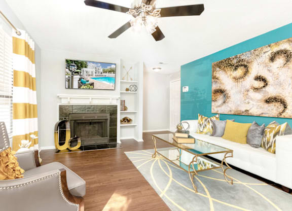 Living Area With Fireplace at Bridges at Mallard Creek Apartment Homes, Charlotte, 28269