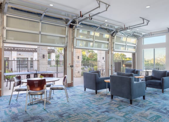 clubhouse with firehouse style garage doors