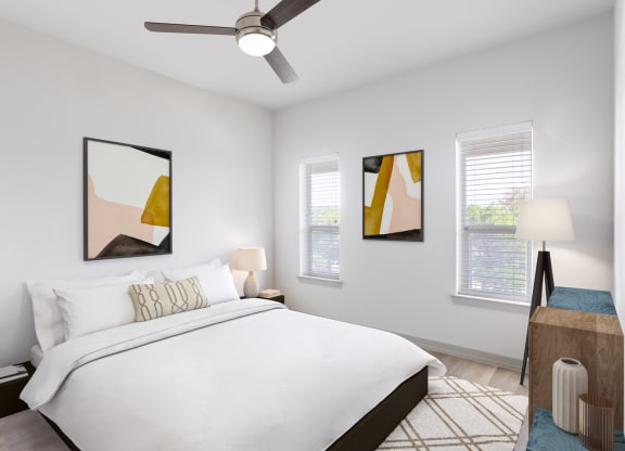 furnished bedroom with ceiling fan