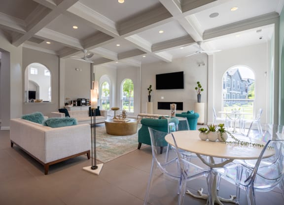 Resident clubhouse common area with couches and chairs