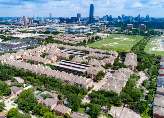 aerial view of the apartment community and surrounding city