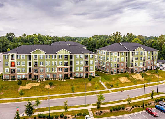 A large apartment complex with multiple buildings and parking lots at Foxwood Apartments, North Carolina