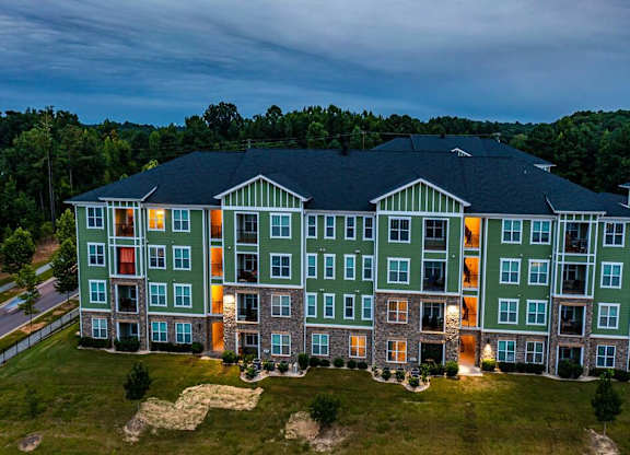A large apartment complex with multiple buildings and balconies at Foxwood Apartments, Raleigh-Durham, North Carolina