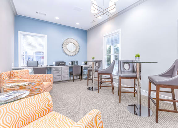 the reserve at bucklin hill leasing office with couches and chairs