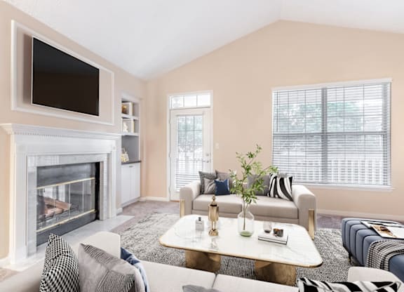 a living room with a fireplace and a tv above it