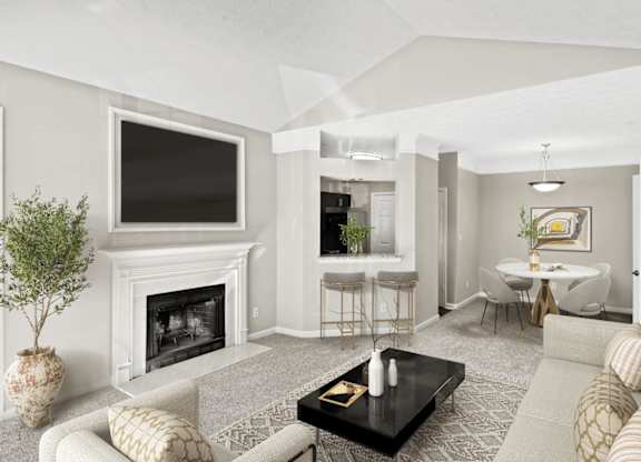 A living room with a fireplace and a television on the wall.