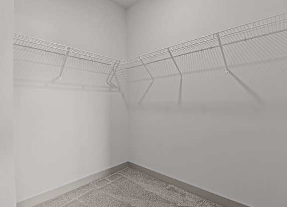 Empty room with a wire shelving unit at Litchford 315 Apartments, Raleigh, NC