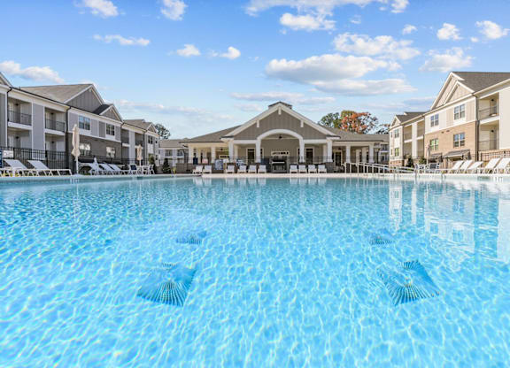 A large swimming pool in front of a resort at Litchford 315 Apartments, North Carolina