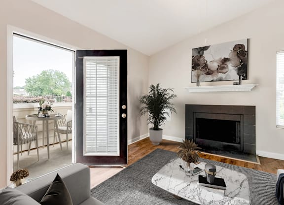 Living Area With Balcony View at Central on the Green Apartment Homes, North Carolina, 27604