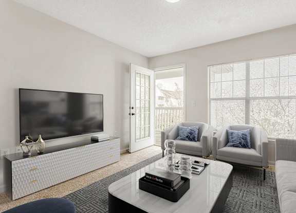 Living Room With TV at The Grayson Apartment Homes, Charlotte