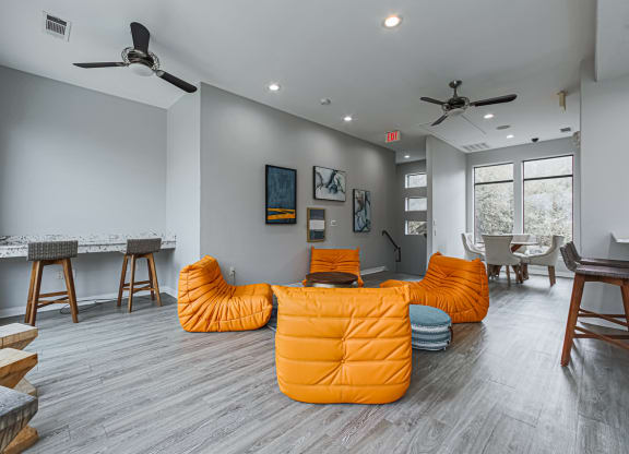 clubhouse with an orange couches