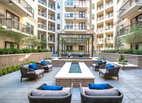 Outdoor sitting area surrounding a water fixture