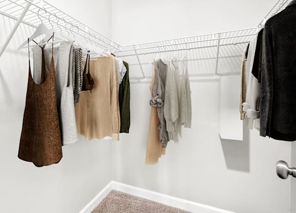 Clothes hanging on a clothesline in a room at Paces Pointe Apartment Homes, Matthews, NC