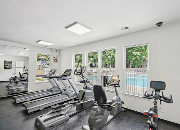 A gym with treadmills and exercise bikes at Regency Park Apartment Homes, Raleigh, NC