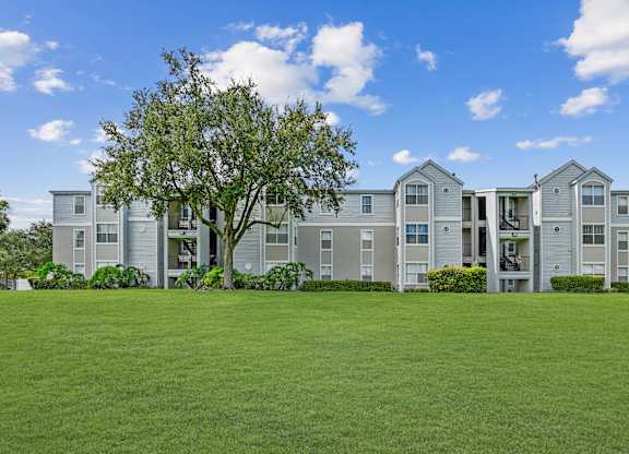 Exterior of apartment buildings with natural surround landscaping
