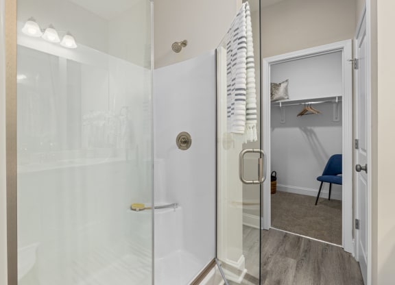 Bathroom with frameless glass shower