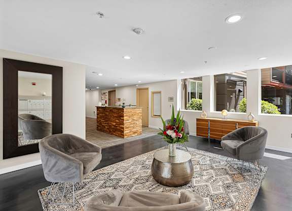 a view of the lobby and front desk at Illumina Apartment Homes, Washington, 98102