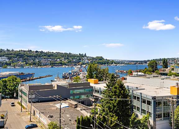 City view of Seattle with a Puget Sound in the background at Illumina Apartment Homes, Seattle, WA