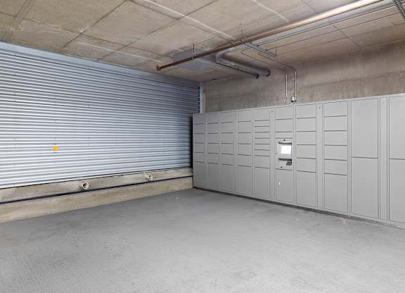 a row of package lockers in a storage facility at Villaggio Apartment Homes, Tacoma, 98402