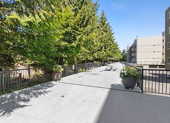 Outdoor Area with Smooth Paving  at West Mall Place Apartment Homes, Everett, 98208