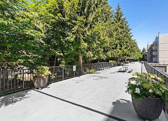 Property Outdoor Space with Potted Plants at West Mall Place Apartment Homes, Washington, 98208