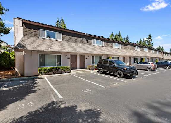 View of Resident Reserved Parking Space in front of Townhome at Woodlake Townhomes, Edmonds